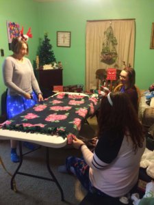 Part of the Crafting Team working away on fleece blankets. 
