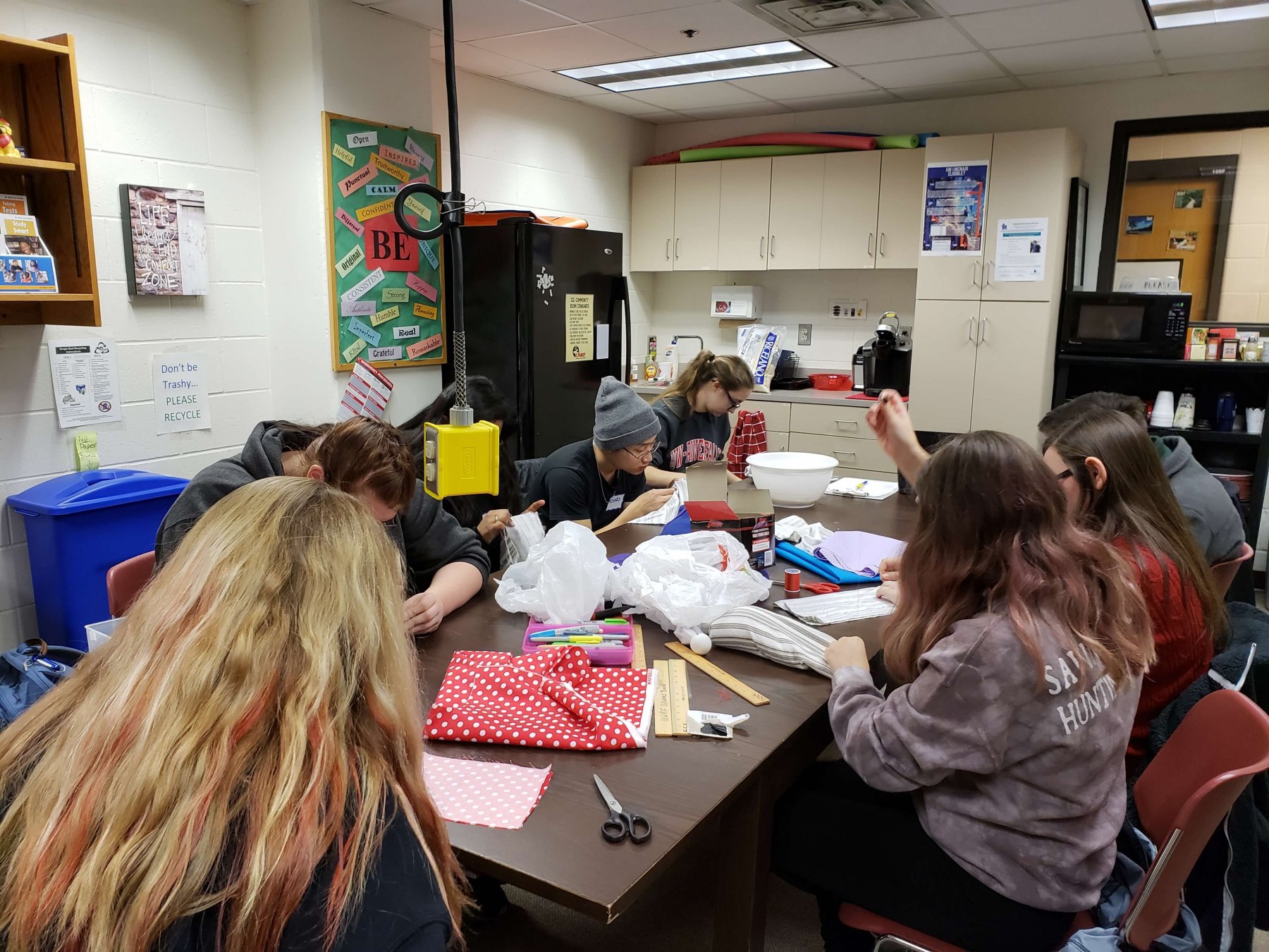 students crafting toys and cozies for shelter pets