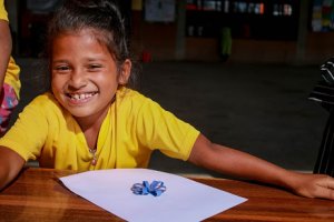Smiling child at Dashain Camp