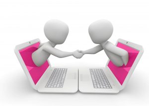 image representing two humans connecting online