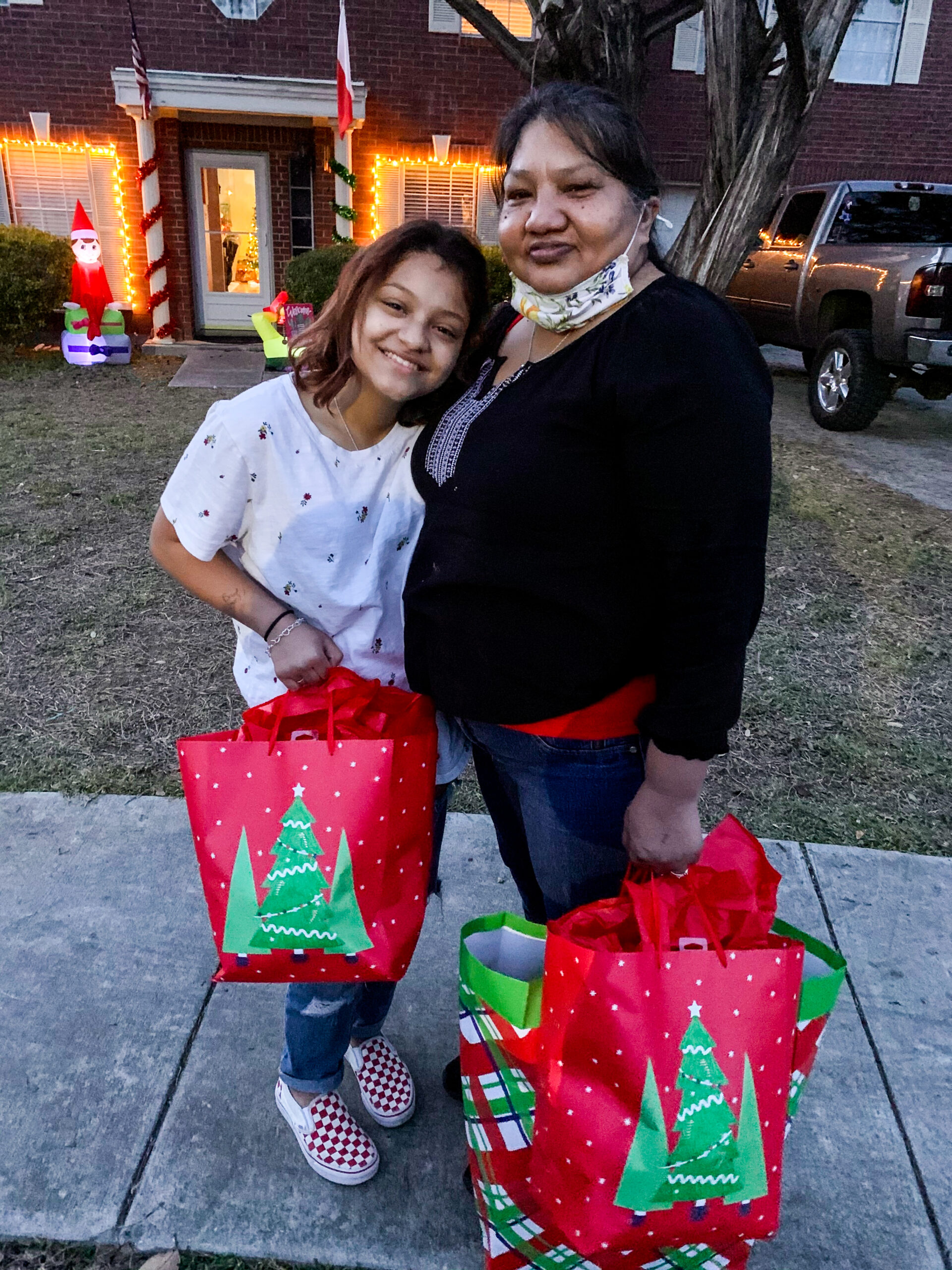 connie and grandchild with gifts