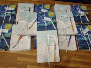 Notebooks and pens for carers